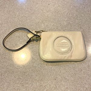 Coach shiney cream wristlet